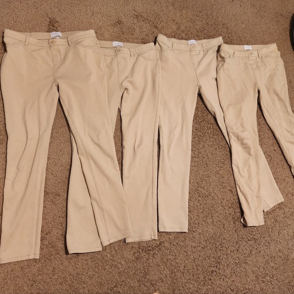 Bundle of girls jeggings uniform pants.